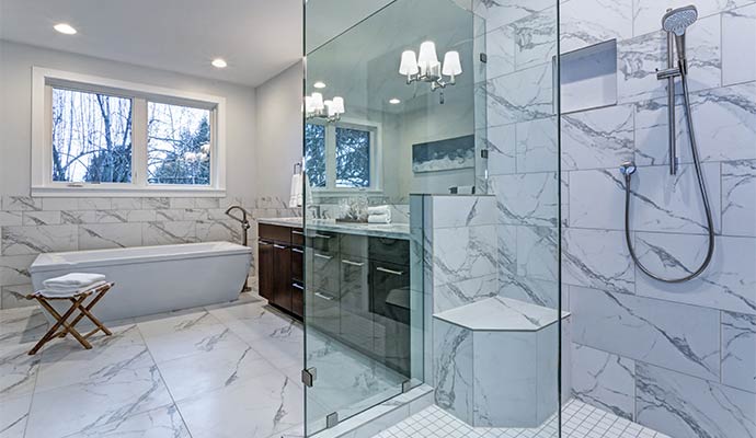 A beautiful bathroom with custom tile shower